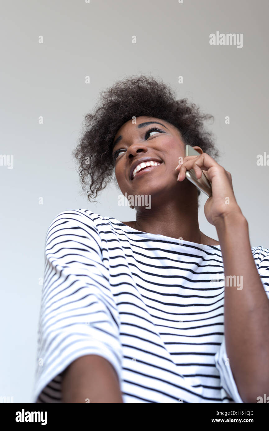 Portrait of a young african american woman at home Stock Photo - Alamy