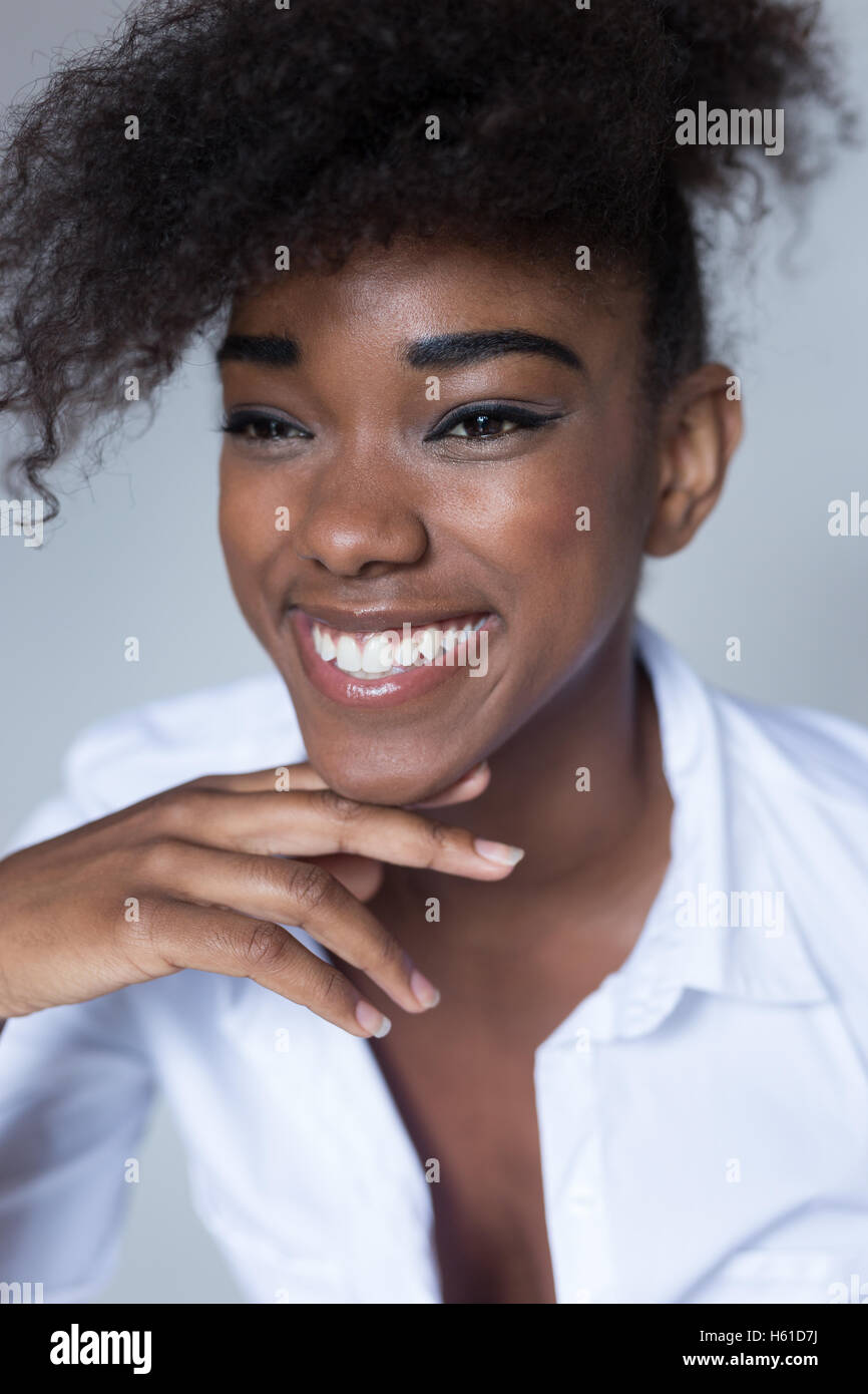 Portrait of a young african american woman at home Stock Photo - Alamy