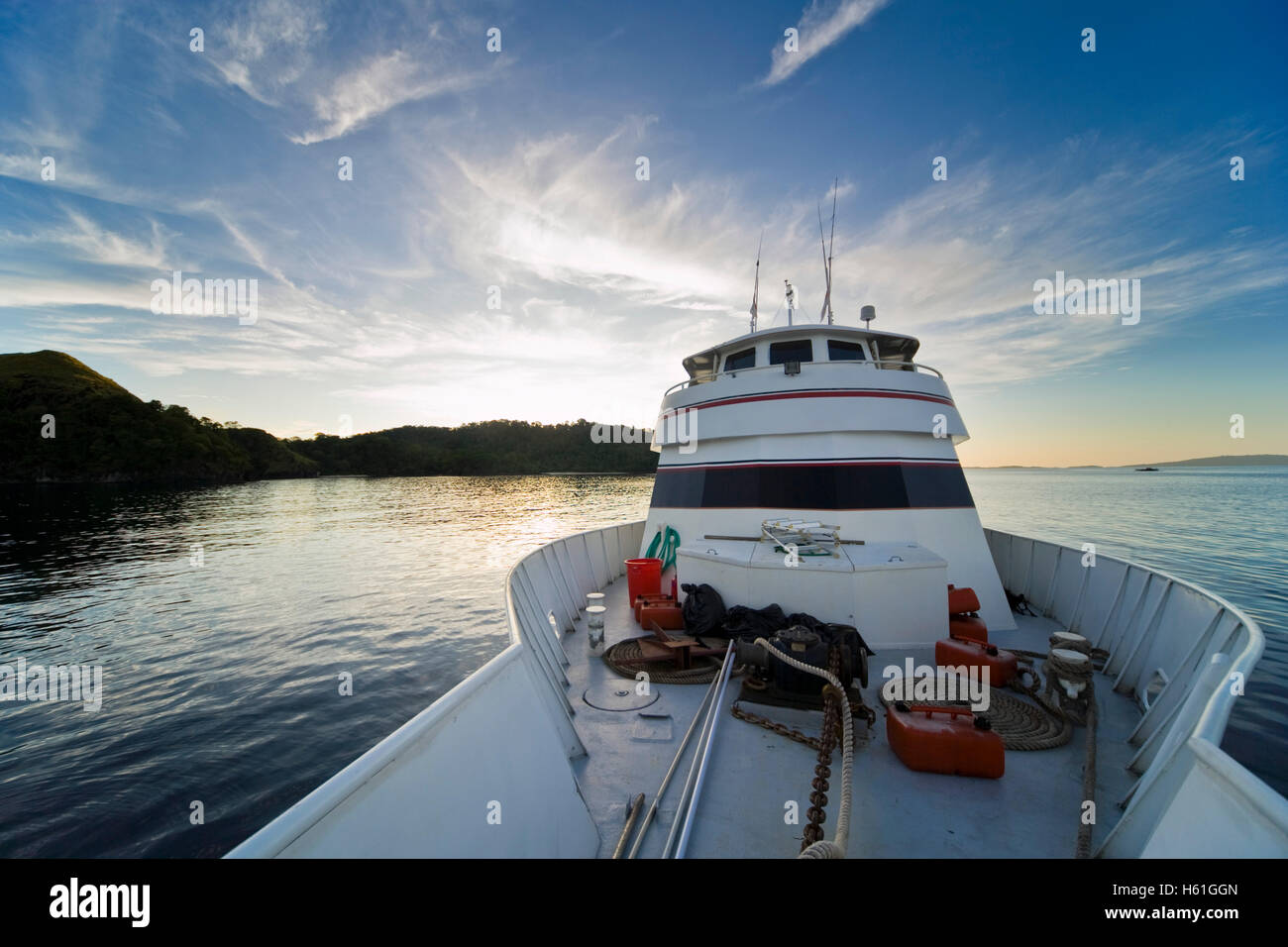 Bow of a boat in front of tropical landscape, Sulawesi, Indonesia, Southeast Asia Stock Photo