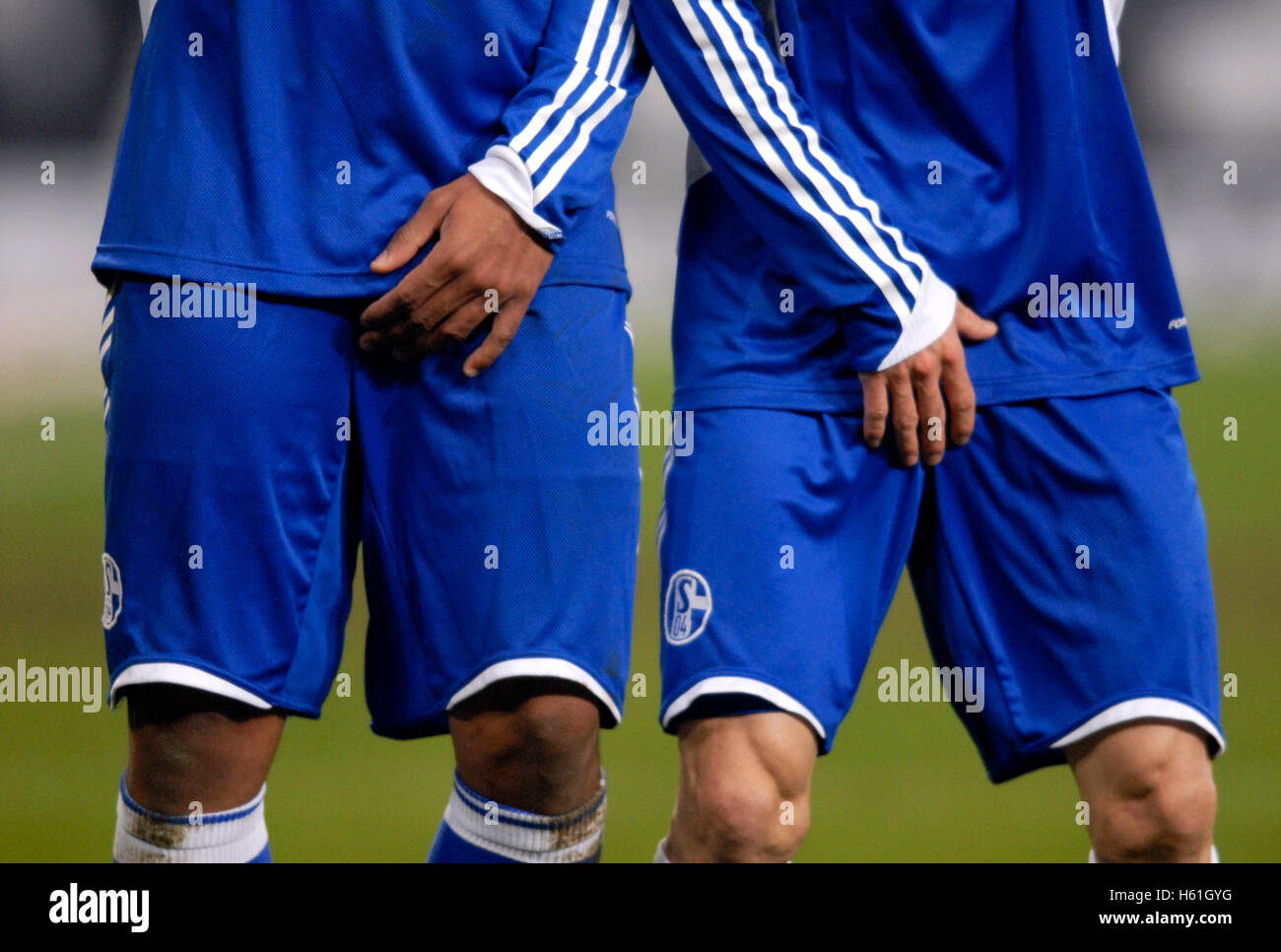Two Schalke players protect themselves in a free-kick, German Soccer League, 2009/2010 season, 20th matchday, match FC Schalke Stock Photo