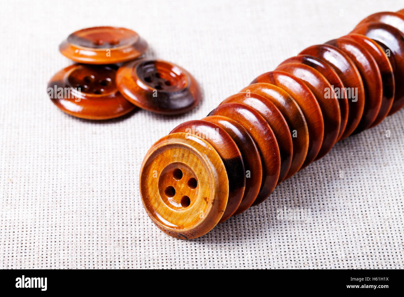 a Vintage wooden buttons background Stock Photo - Alamy