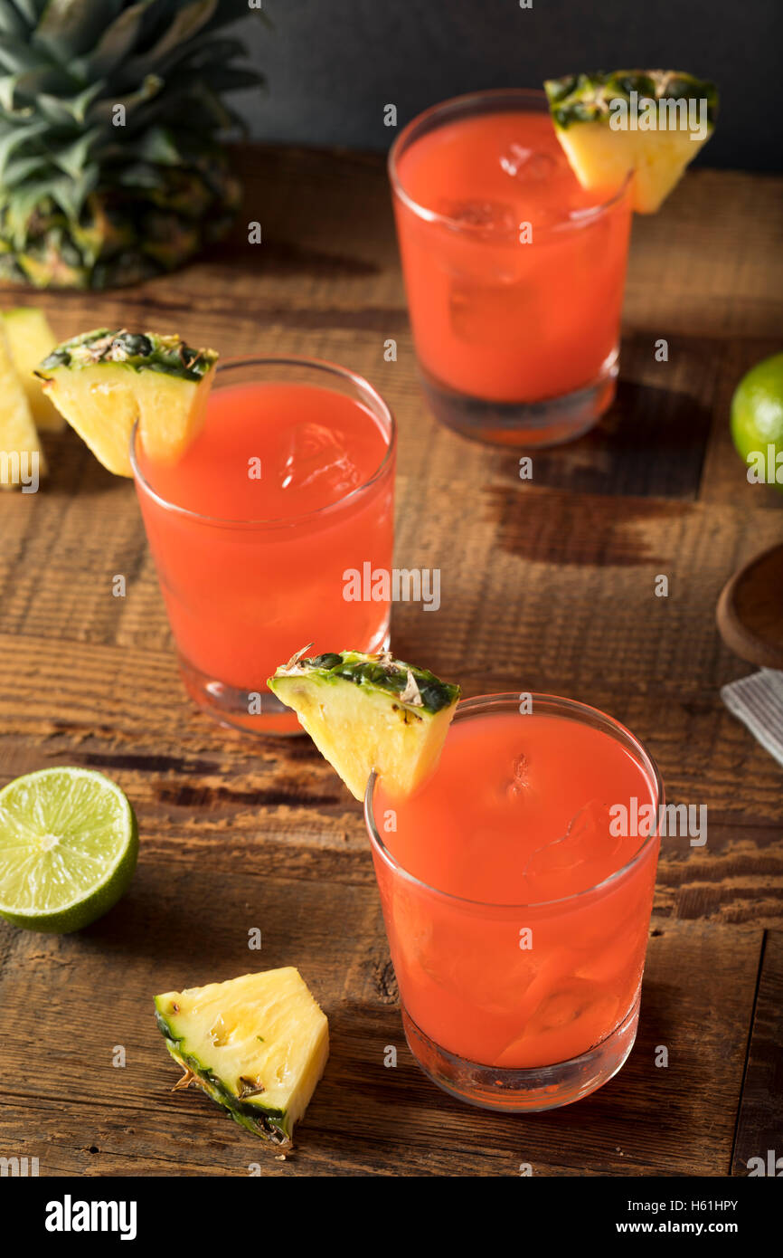Homemade Jamaican Rum Punch with Lime and Pineapple Stock Photo