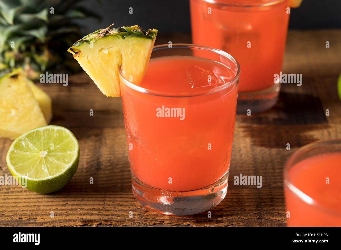 Homemade Jamaican Rum Punch with Lime and Pineapple Stock Photo