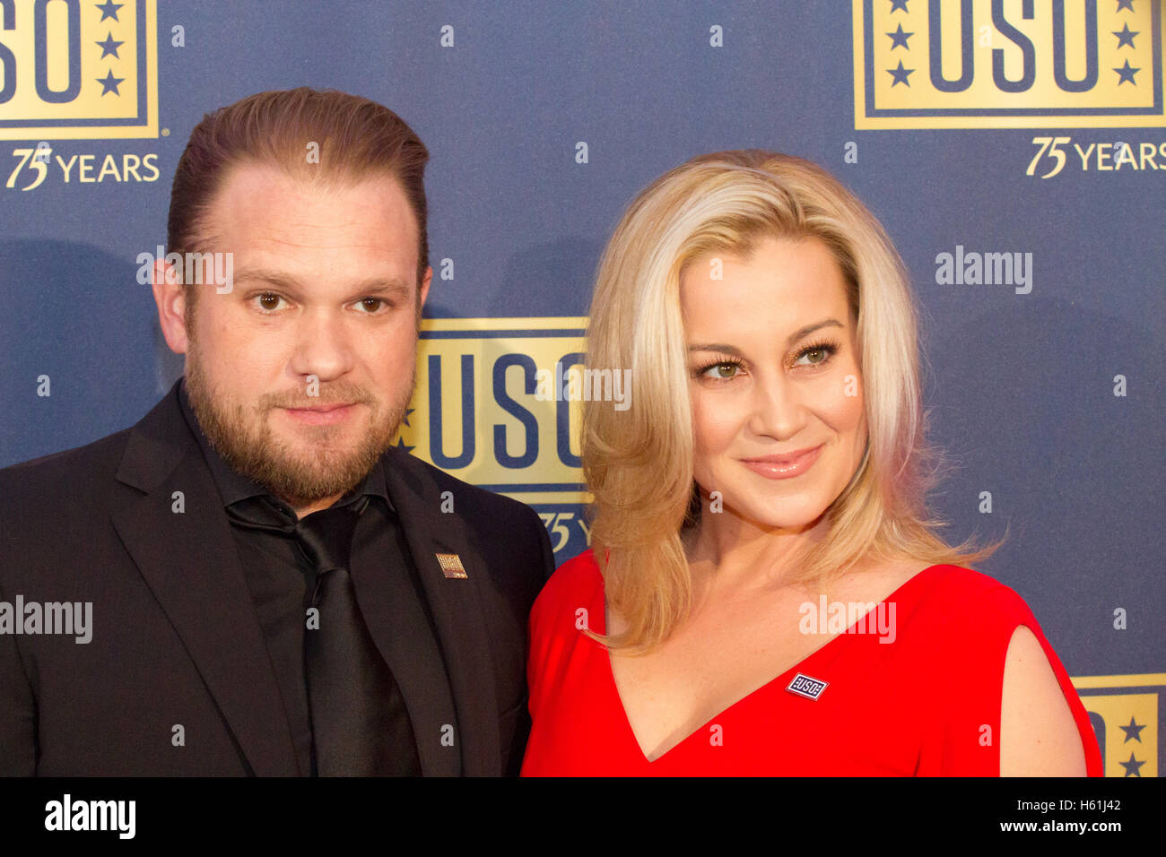 Kellie Pickler and Kyle Jacobs arrive on the red carpet for the USO Gala at the DAR Constitution Hall on October 20, 2016 in Washington DC. Stock Photo
