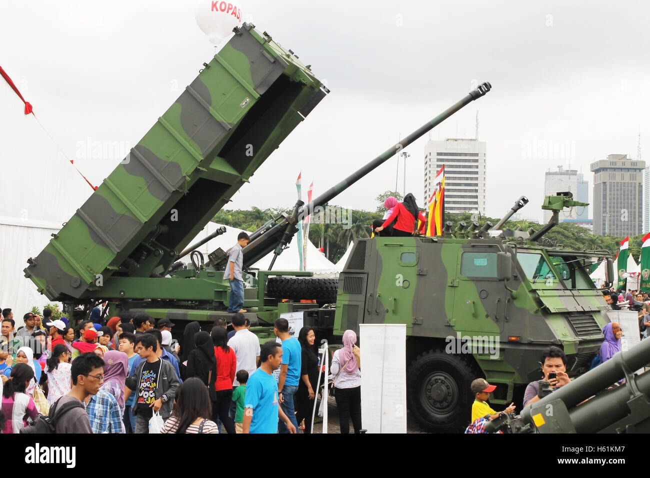 People looking at multiple launcher rocket system vehicle Astros II MK6 in Indonesian Armed Force Exhibition. Stock Photo