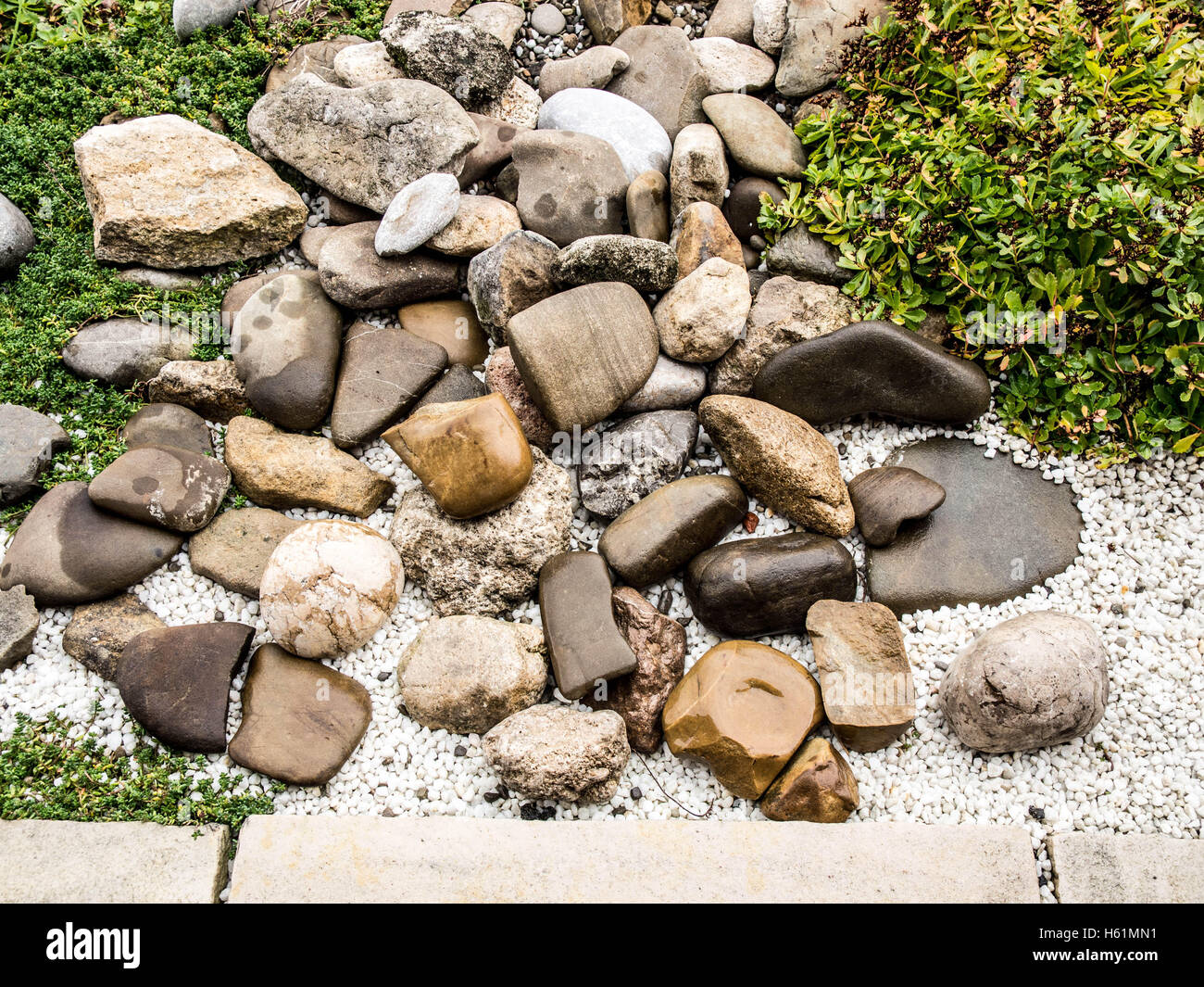 Grass Rocks Seem Less Grass rocks hi-res stock photography and images - Alamy