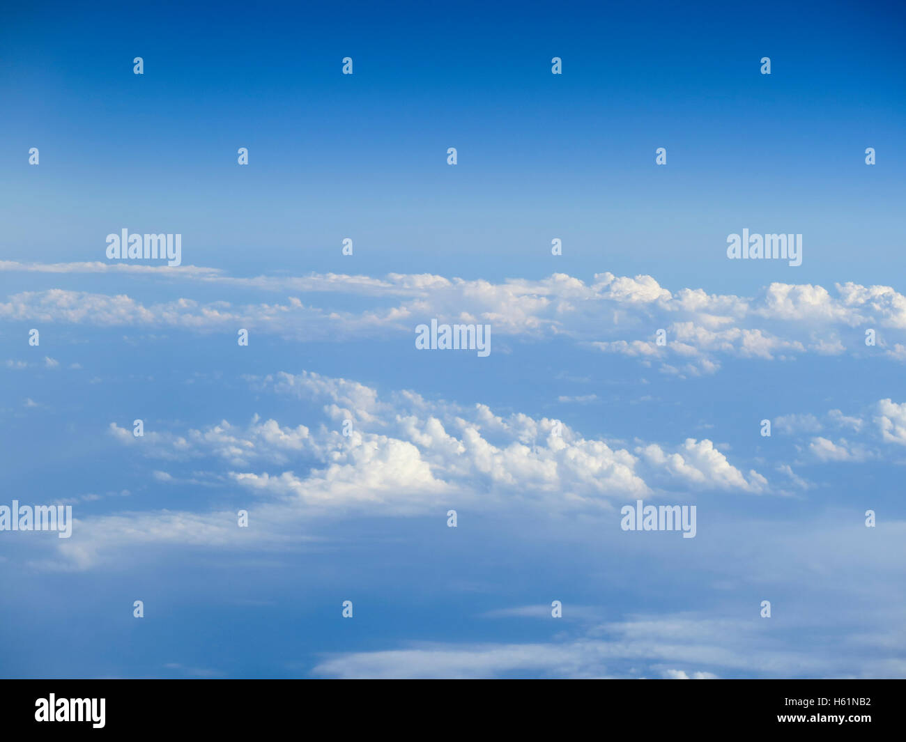 Beautiful cloudscape on a blue sky as seen from above Stock Photo