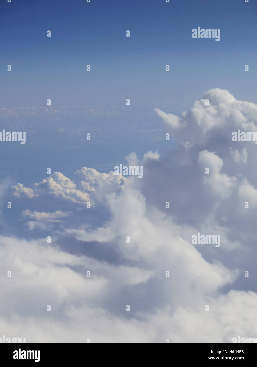 Beautiful cloudscape on a blue sky as seen from above Stock Photo