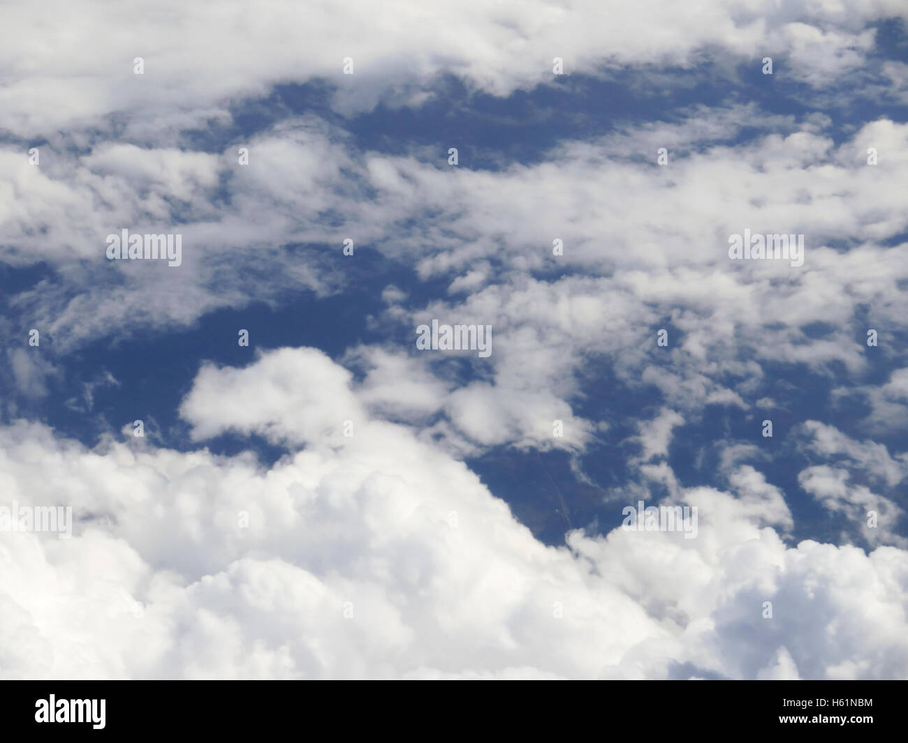 Beautiful cloudscape on a blue sky as seen from above Stock Photo