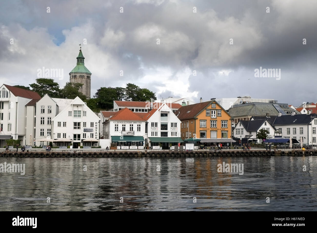 Stavanger, Norway - July 2016: The harbour 'Vaagen' and quayside shops, bars and restaurants of  the former sea houses Stock Photo