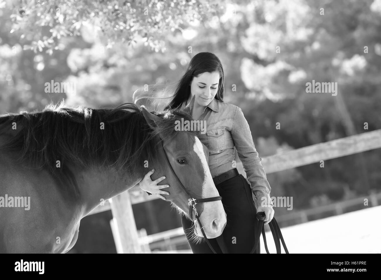 Woman and his horse, equestrian center, France Stock Photo