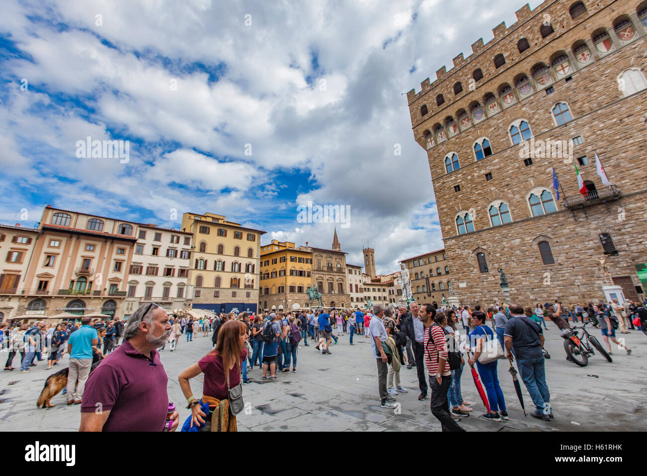 FLORENCE, ITALY - SEPTEMBER 18, 2016: Unidentified people at Piazza della Signoria in Florence, Italy. It is the focal point of Stock Photo