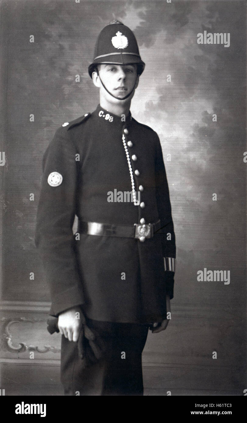 Vintage portrait of a British police constable in the uniform of the Caernarfon constabulary dated June 5th 1926 Stock Photo