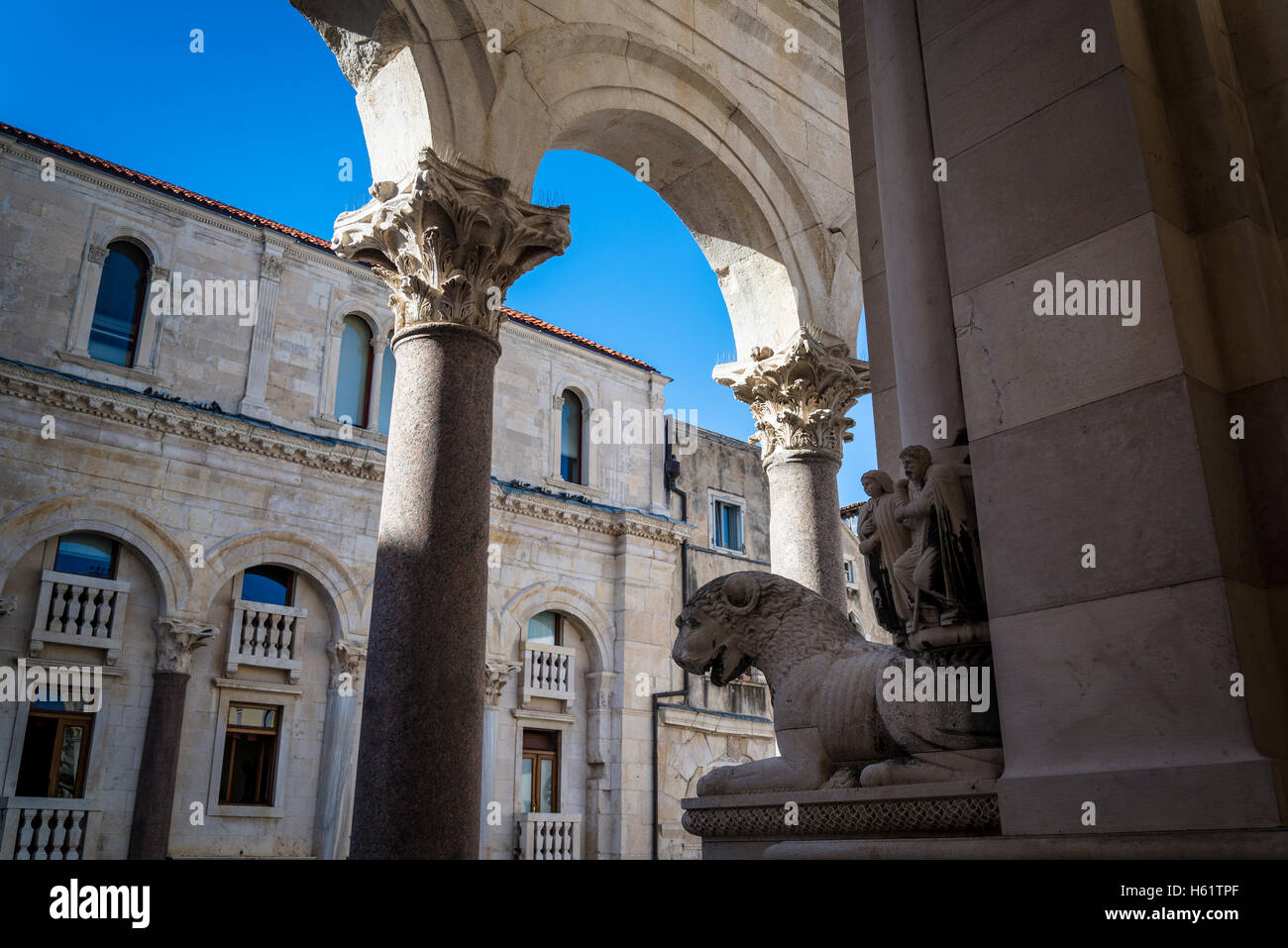 Romanesque sculpture of the Cathedral of Saint Domnius and Peristyle arches, Diocletian Palace, Split, Croatia Stock Photo