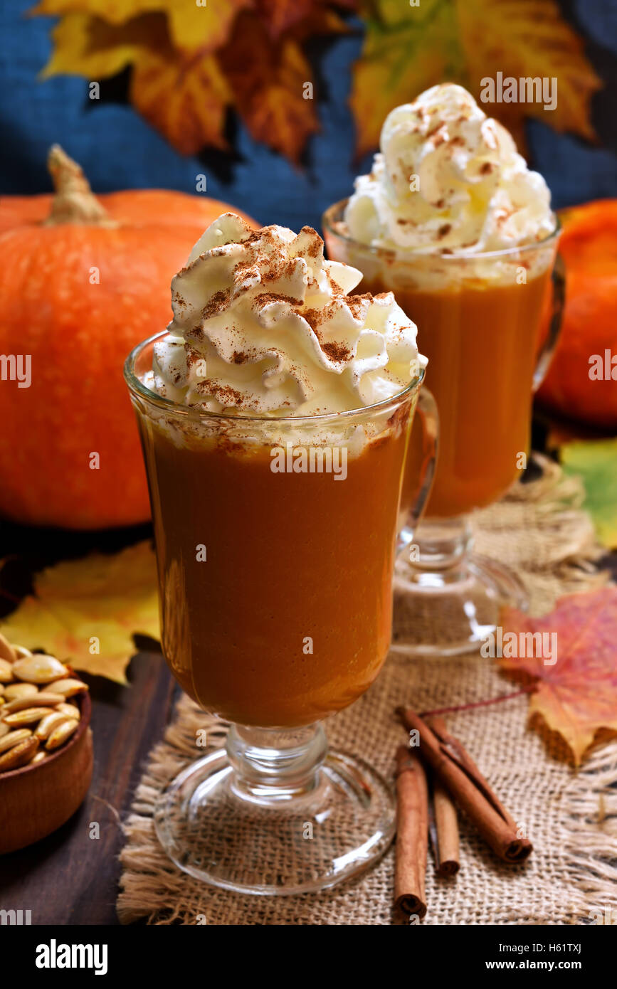 Pumpkin latte with whipped cream, autumn seasonal beverage Stock Photo ...