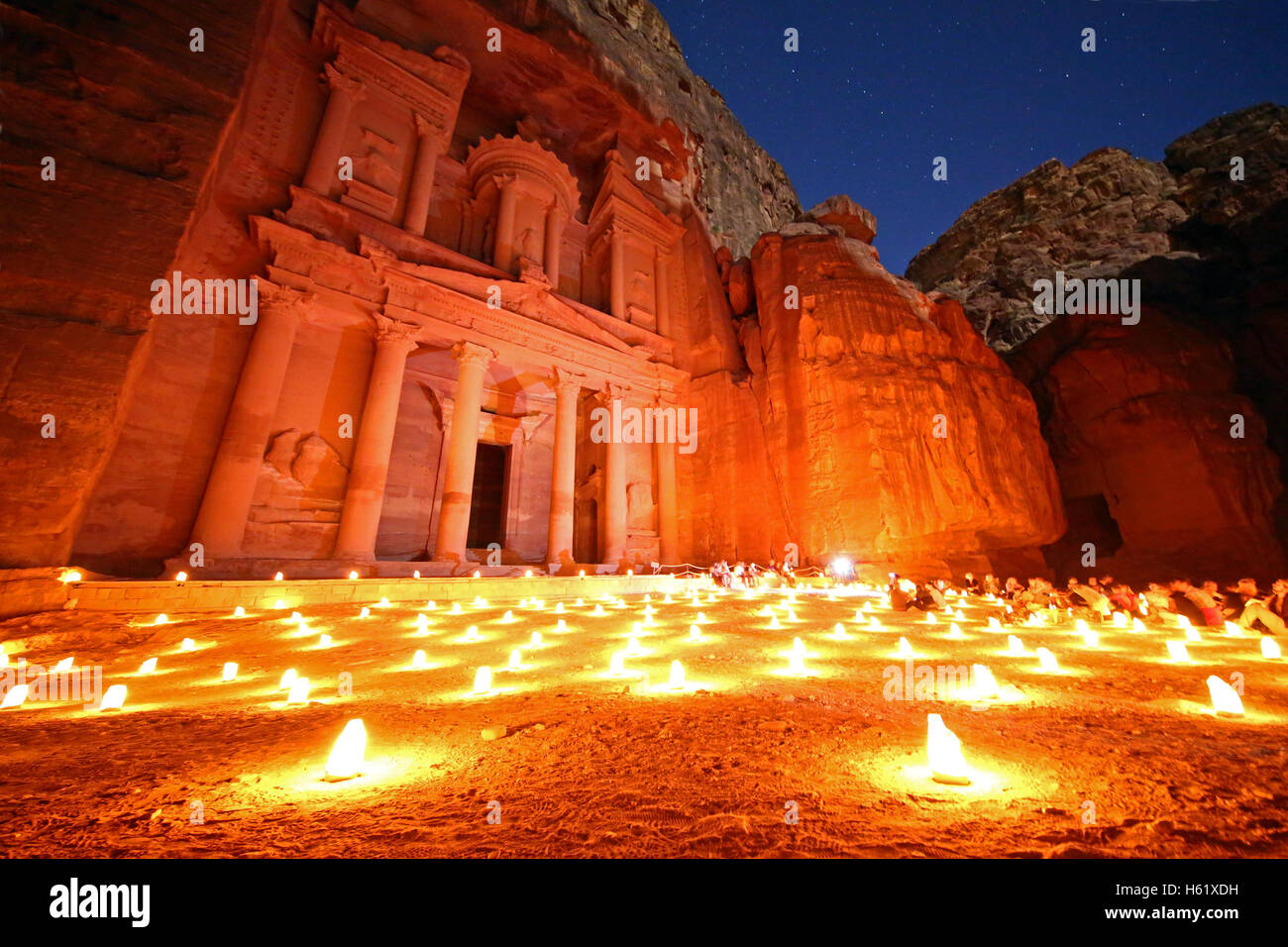 View of the Treasury, Al-Khazneh, at night with candles, Petra, Jordan Stock Photo