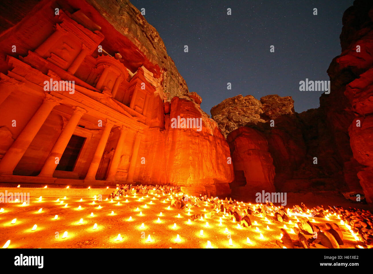 View of the Treasury, Al-Khazneh, at night with candles, Petra, Jordan Stock Photo
