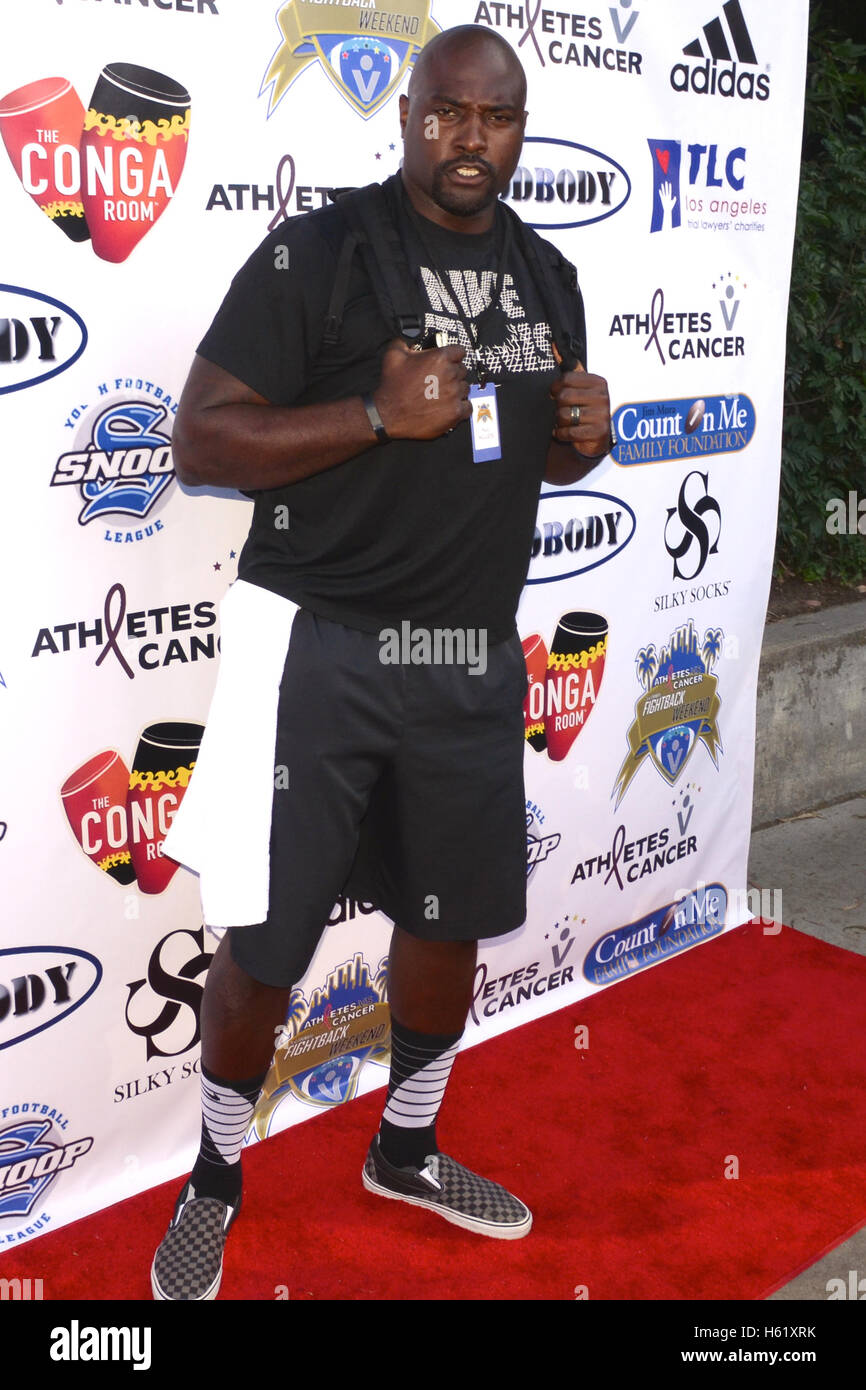 Marcellus Wiley arrived at the Athletes Vs. Cancer Celebrity Flag