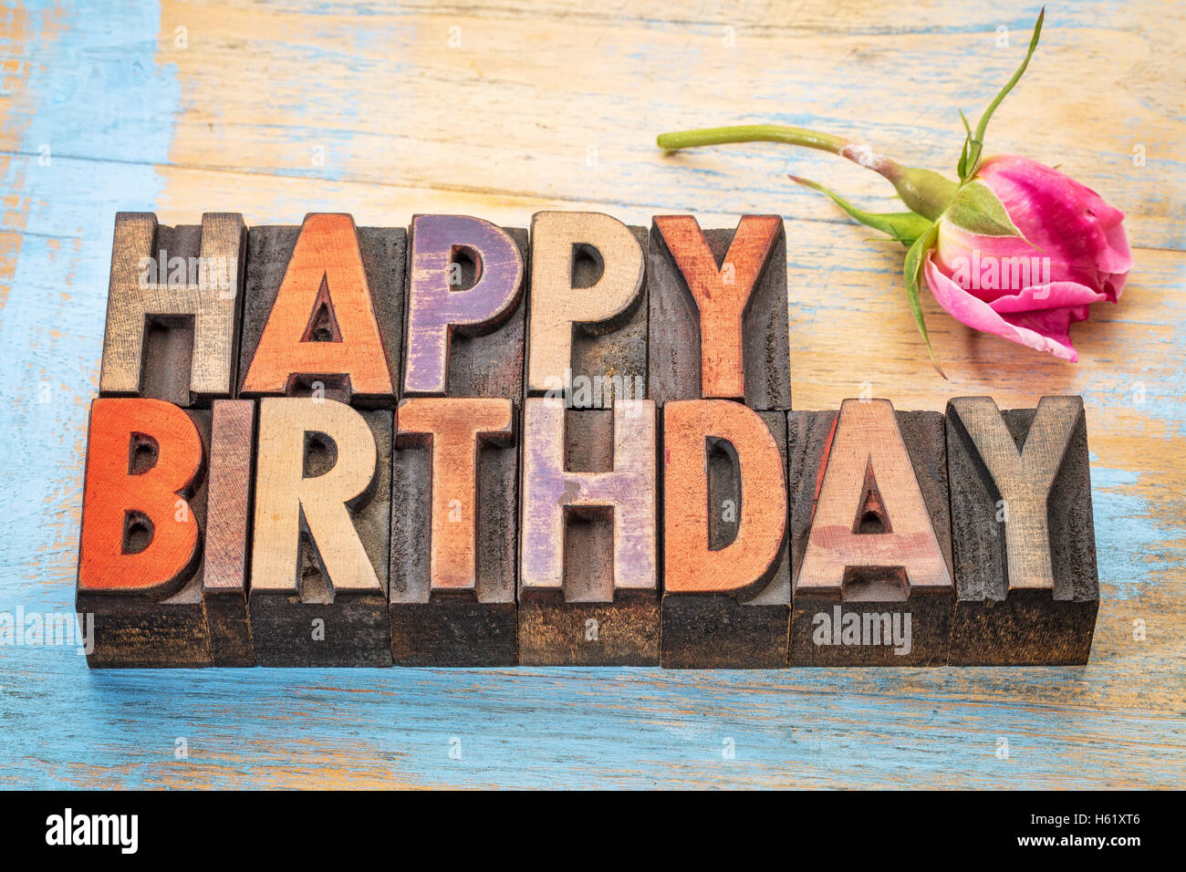 Happy Birthday Greeting Card Word Abstract In Vintage Letterpress Wood Type Stained By Color Inks With A Pink Rose Stock Photo Alamy