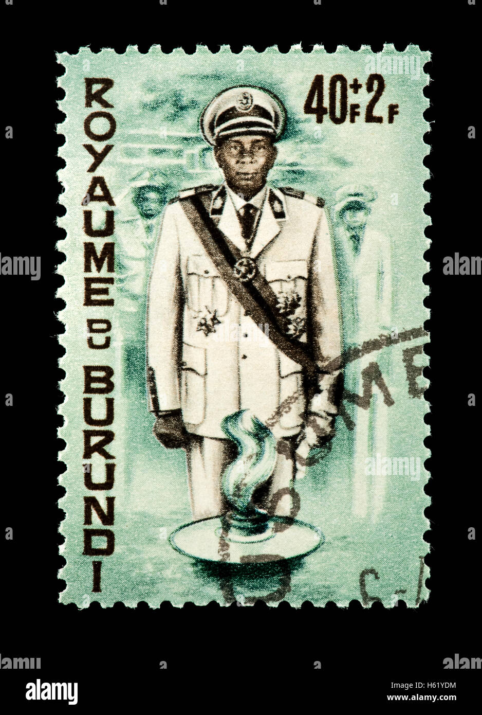 Postage stamp from Burundi depicting King Mwami Mwambutsa IV and the grave of President Kennedy. Stock Photo