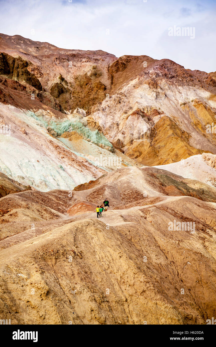 Family hiking on Artist's Palette, Death Valley, California, USA Stock Photo