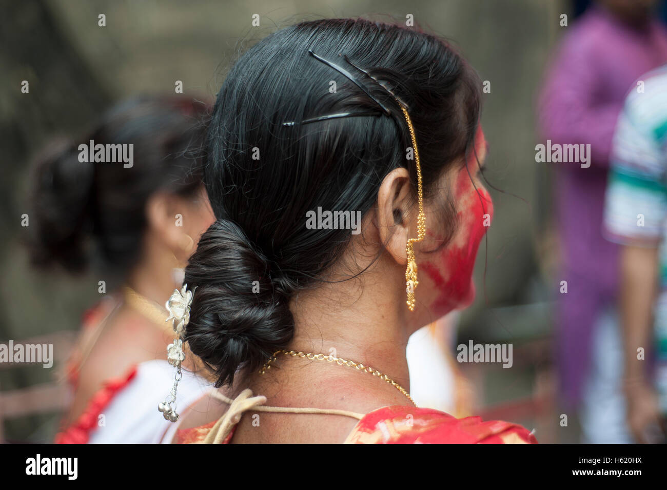 Sindoor Khela Bengali Married Women in Bun Hairstyles at Durga puja Kolkata  West Bengal India Stock Photo - Alamy