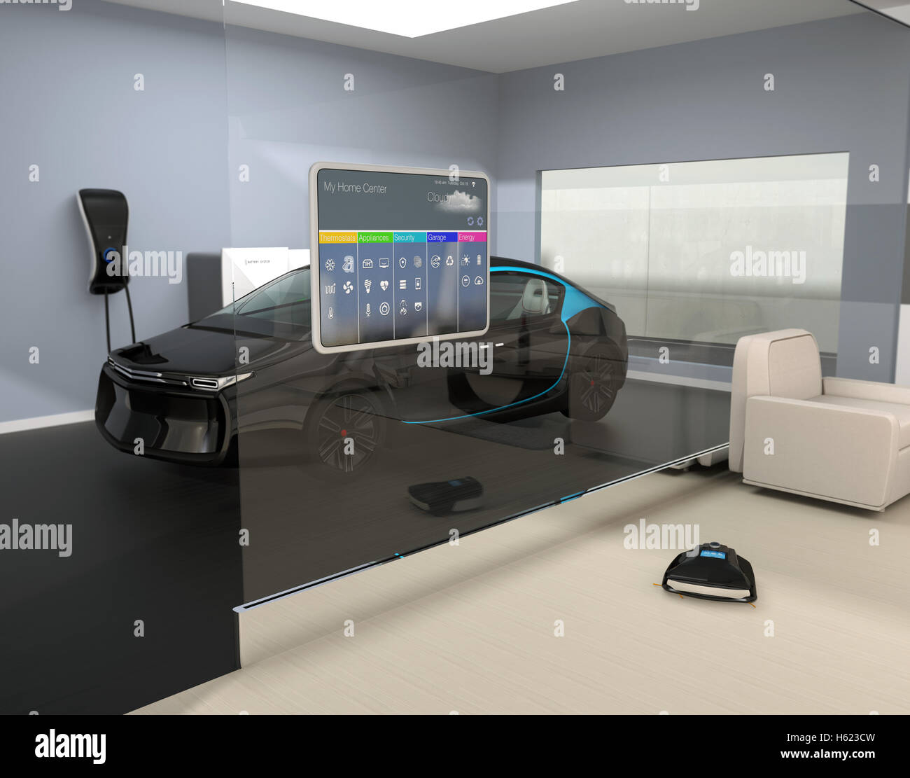 Home automation control panel on the glass wall. From the living room's glass wall could see black EV parking in garage. Stock Photo