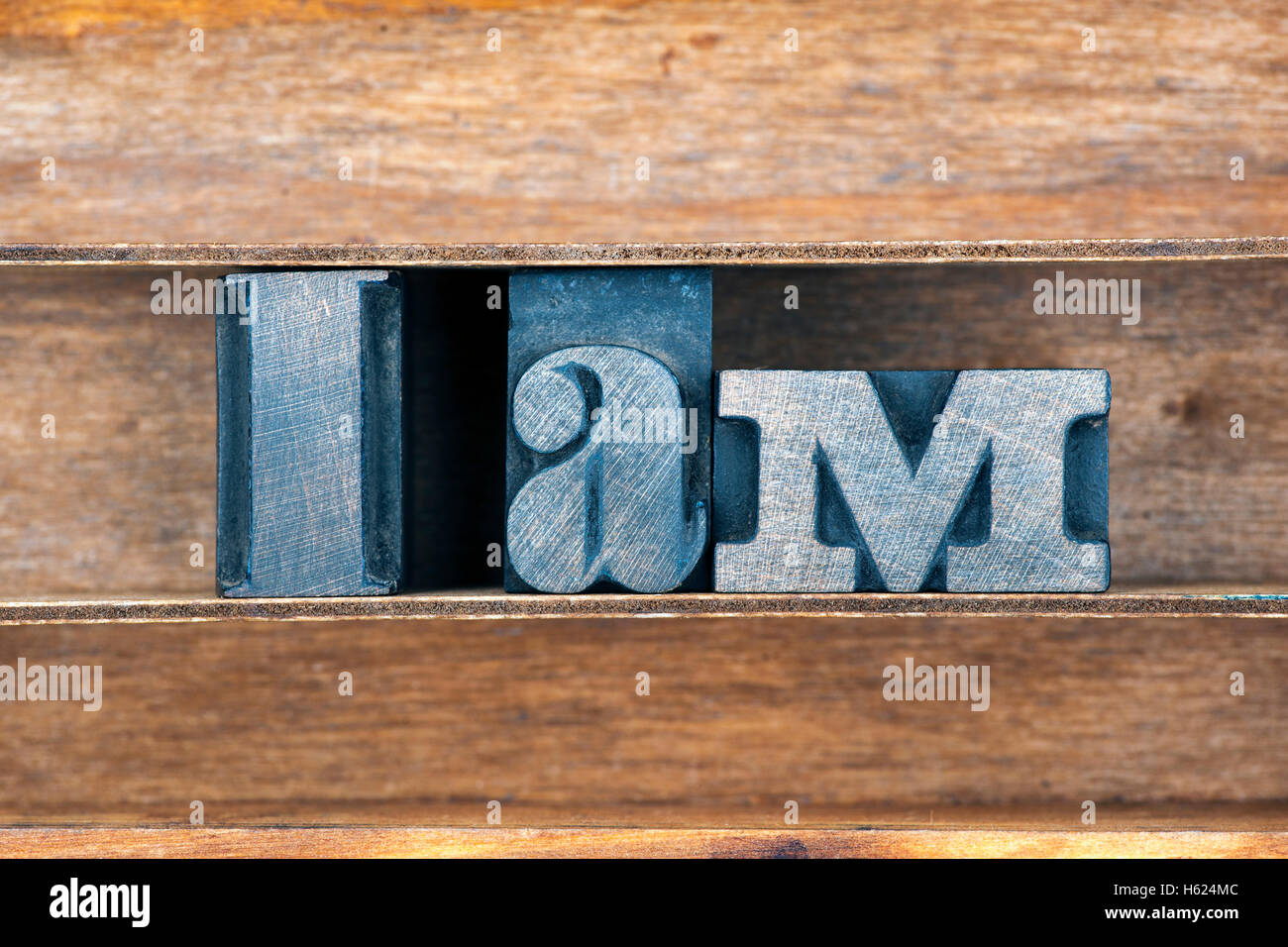 I am phrase made from vintage letterpress type on wooden tray Stock Photo