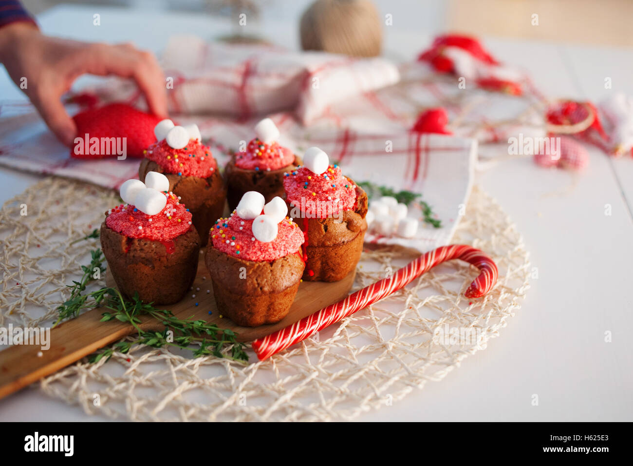 New Year celebration cupcakes, chocolate muffins on table Stock Photo