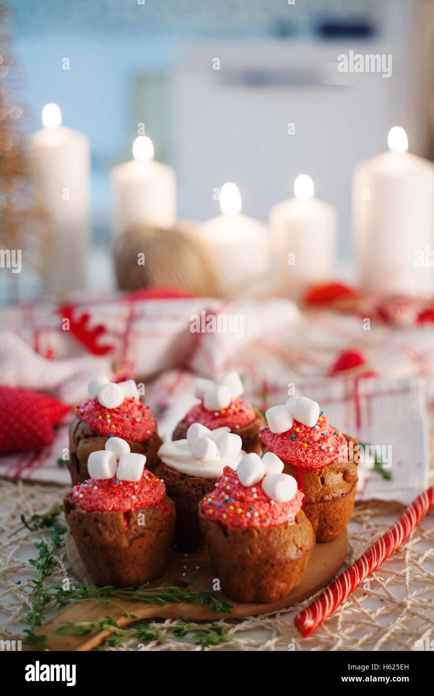 New Year celebration cupcakes, chocolate muffins on table Stock Photo