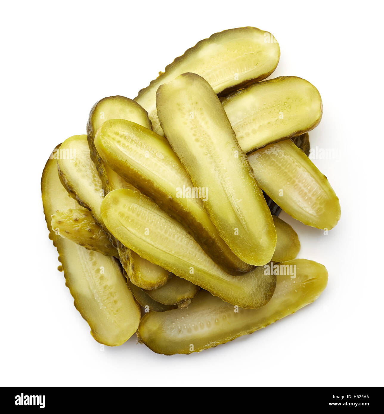 Heap of sliced pickled cucumber isolated on white, top view Stock Photo