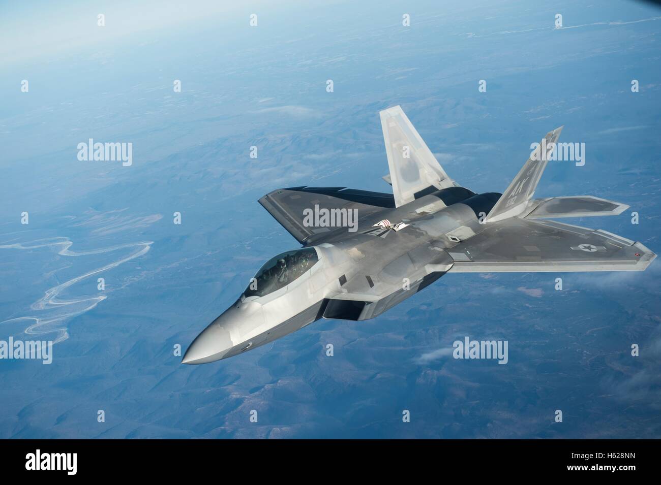An U.S Air Force F-22 Raptor aircraft in flight during the NORAD Vigilant Shield 17 training exercise at Joint Base Elmendorf-Richardson October 17, 2016 in Anchorage, Alaska. Stock Photo