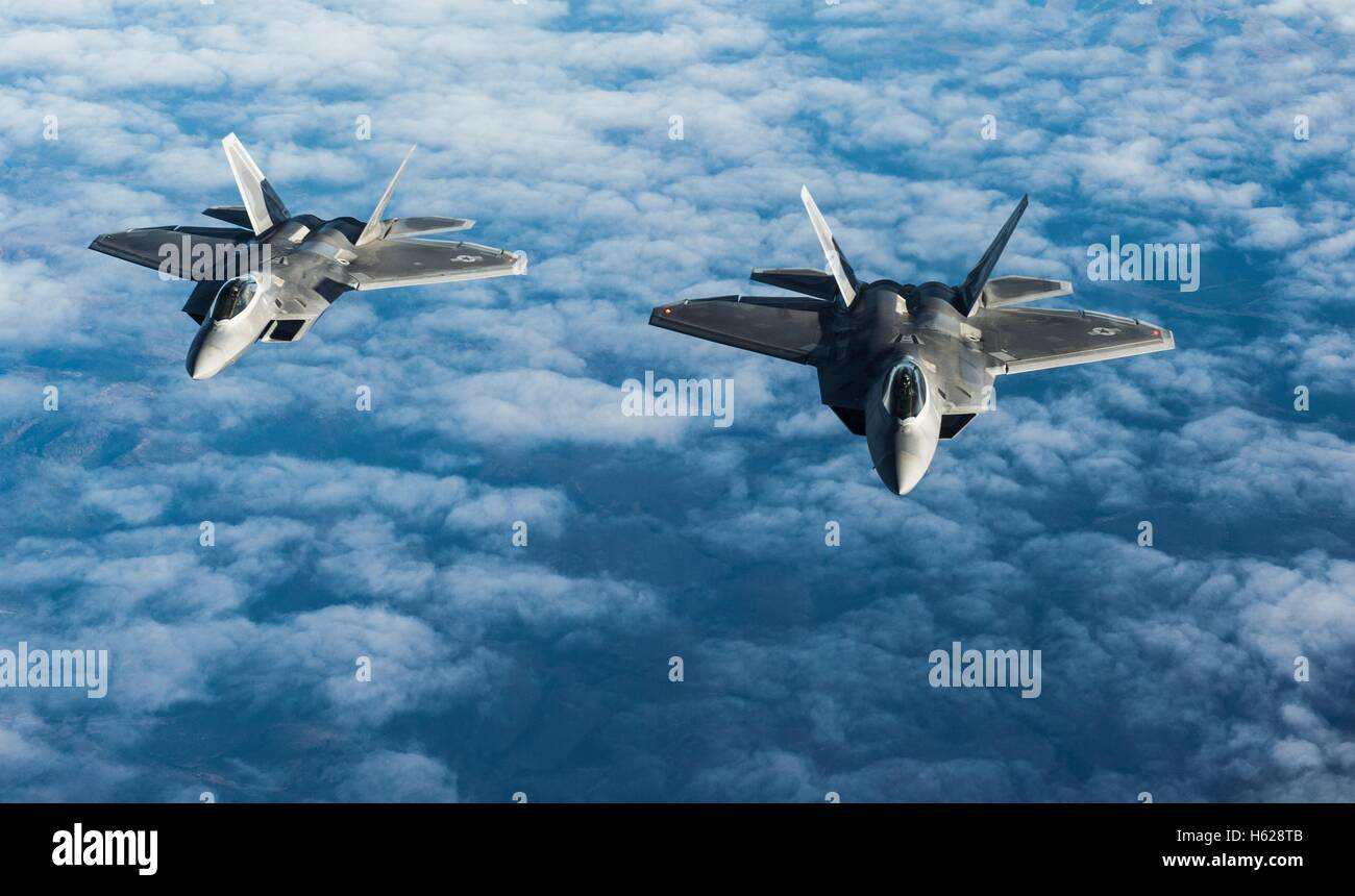 U.S Air Force F-22 Raptor stealth fighter aircraft in flight formation during the NORAD Vigilant Shield 17 training exercise at Joint Base Elmendorf-Richardson October 17, 2016 in Anchorage, Alaska. Stock Photo