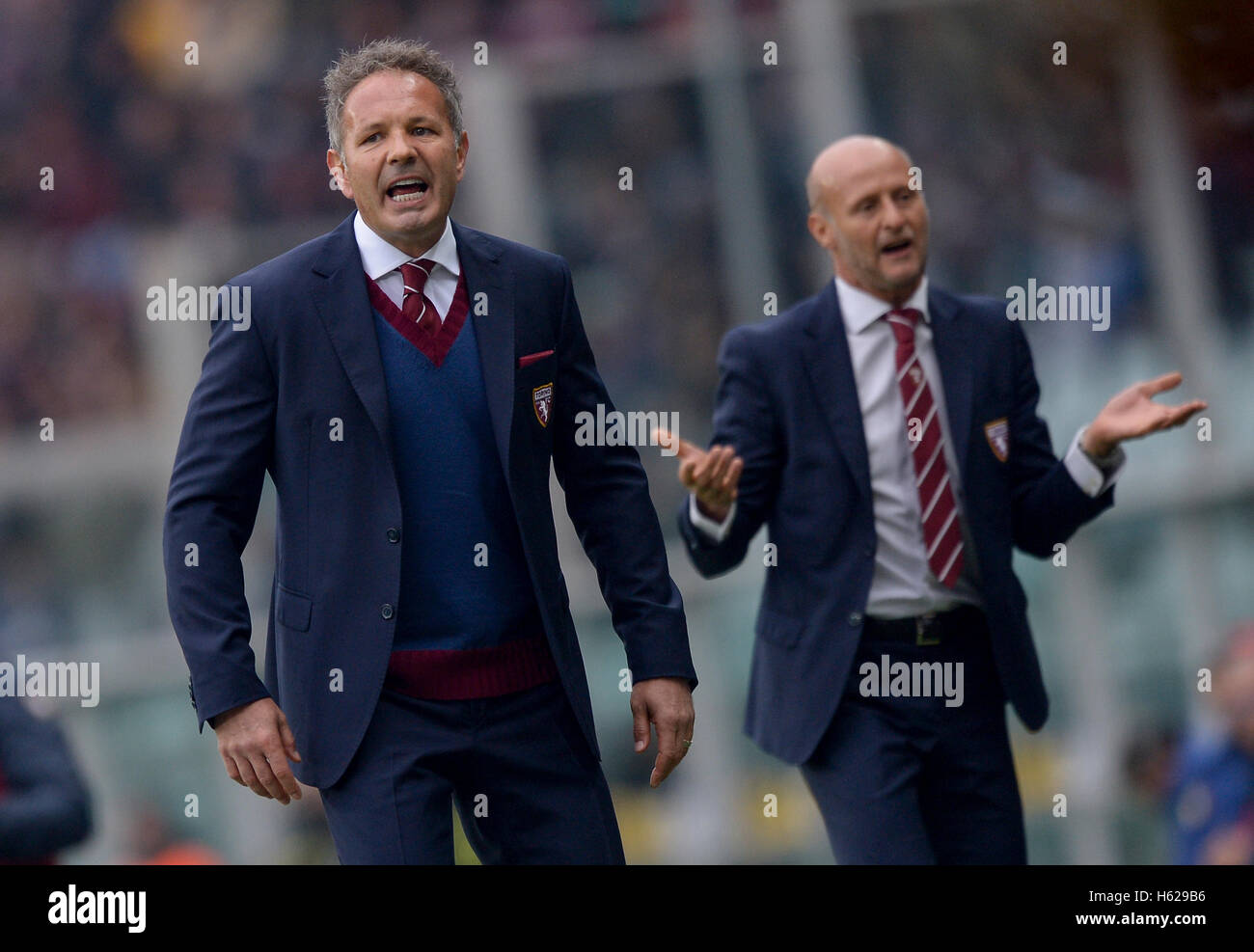 Turin, Italy. 23rd Oct, 2016. Sinisa Mihajlovic (left), head coach of Torino FC, and his assist coach Attilio Lombardo look on during the Serie A football match between Torino FC and SS Lazio. The final result was 2-2 © Nicolo Campo/Pacific Press/Alamy Live News Stock Photo