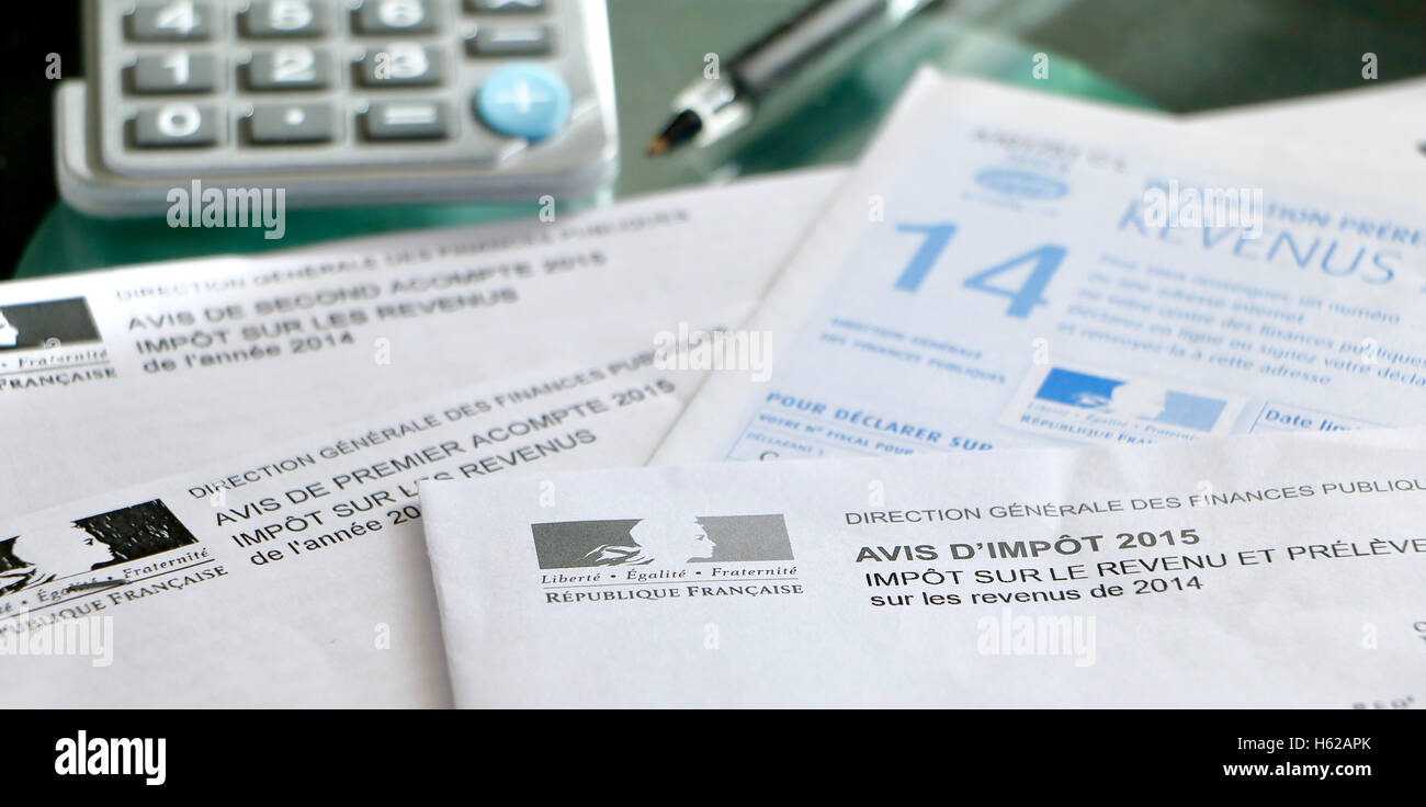 french-tax-forms-on-a-desk-with-a-pan-and-a-calculator-stock-photo-alamy