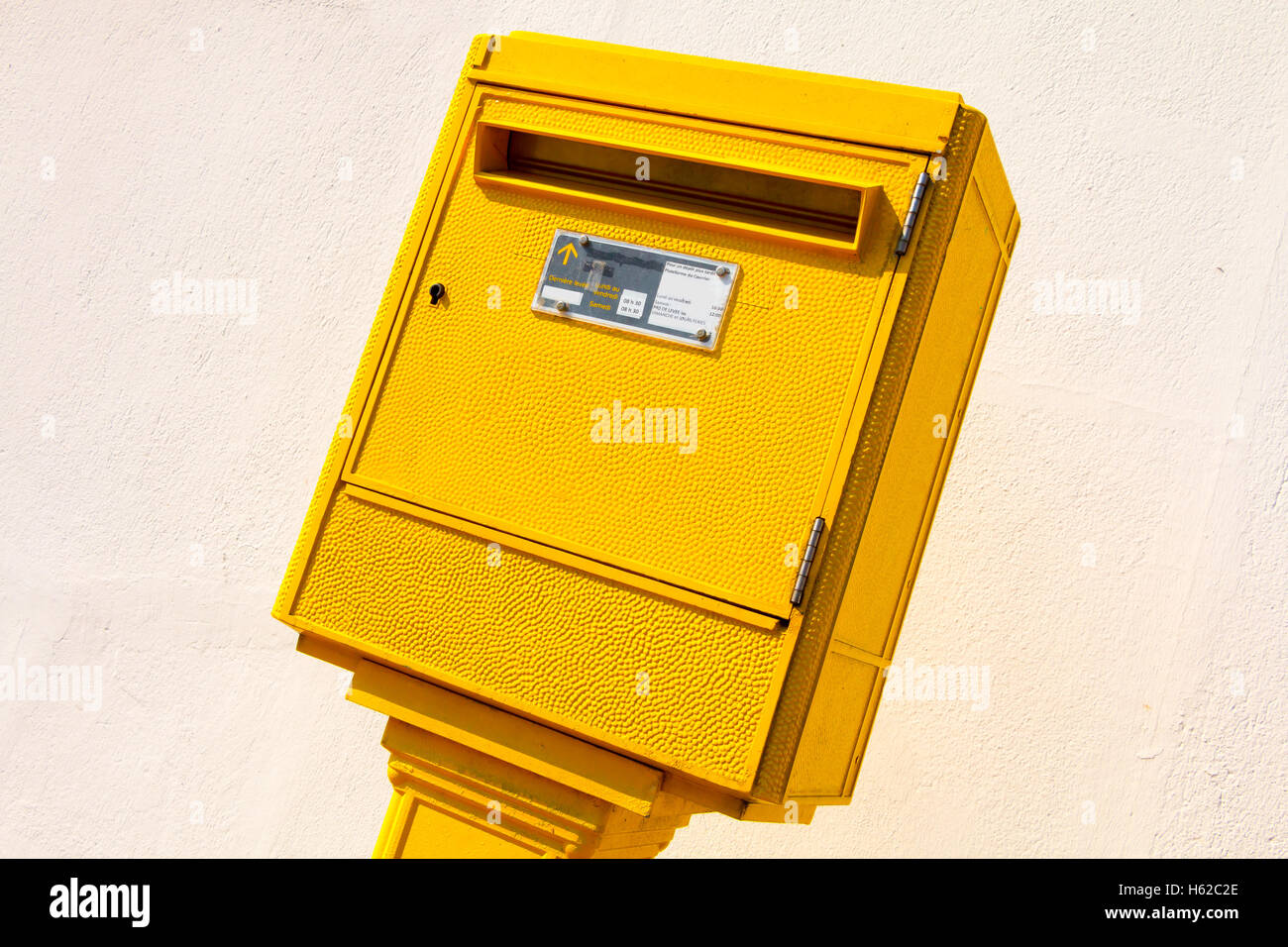 yellow letter Box in the street Stock Photo Alamy