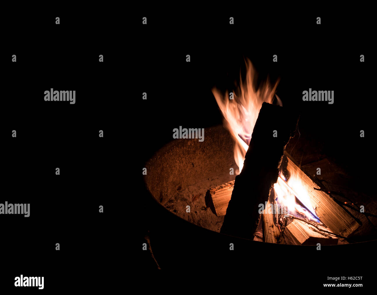 Fire Pit Flames in a campsite fire ring Stock Photo Alamy