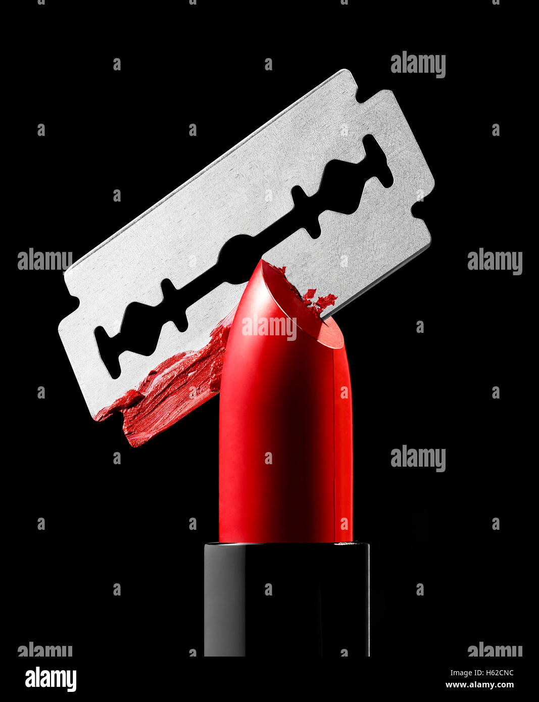 Razor blade cutting through red lipstick Stock Photo 124214424 Alamy