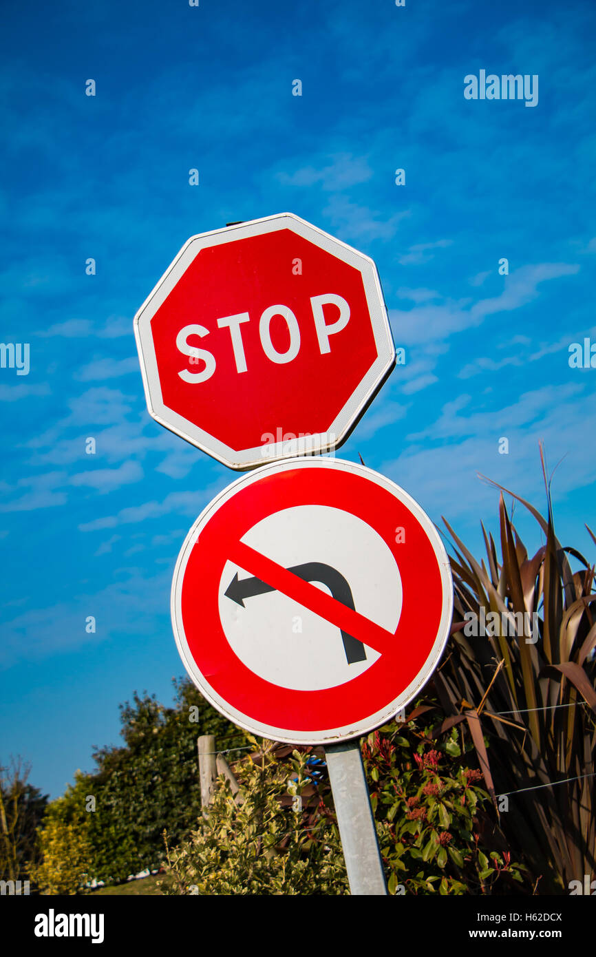 stop and prohibition of turning left signs on the campaign Stock Photo