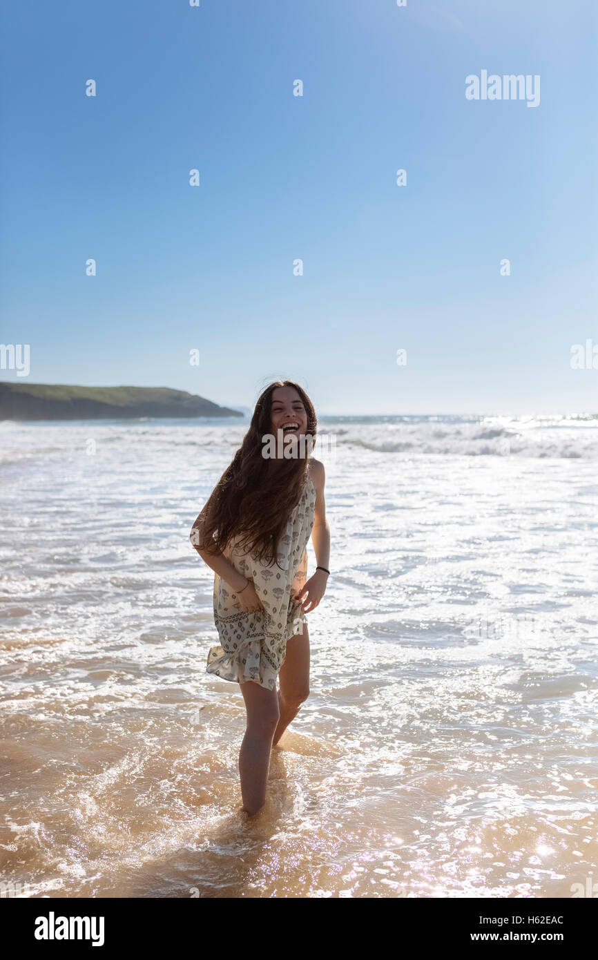 Woman in dress wading in water hi-res stock photography and images - Alamy