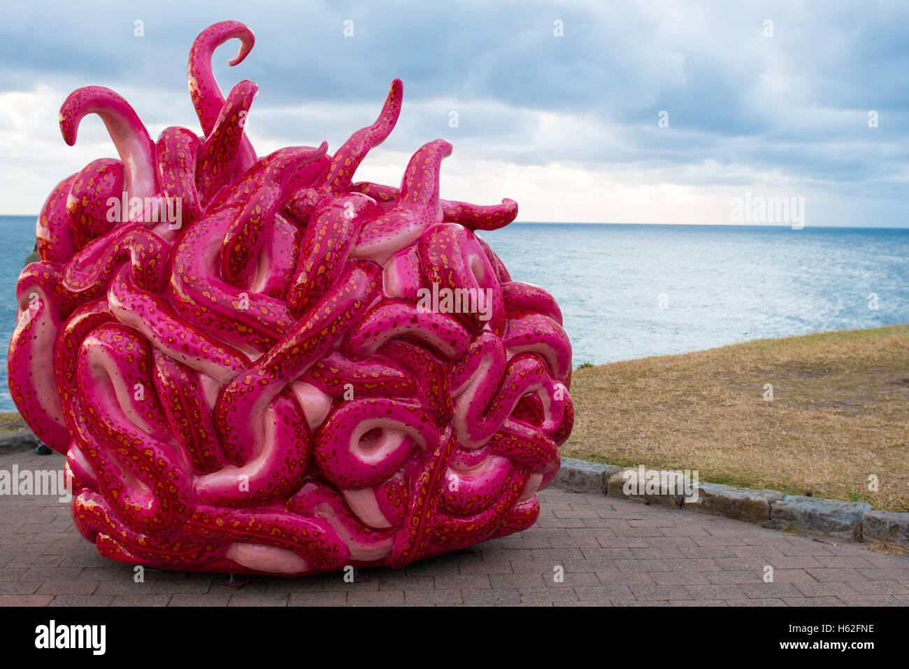 Sydney, Australia. 23rd Oct, 2016. The annual art exhibition 'Sculpture the Sea' along the Bondi to Tamarama costal walk. The 2016 exhibition will be taking place from the 20th of October until the 6th of November. Pictured is the artwork 'Dearest' by Margarita Sampson (with Fieldy) Credit:  mjmediabox/Alamy Live News Stock Photo