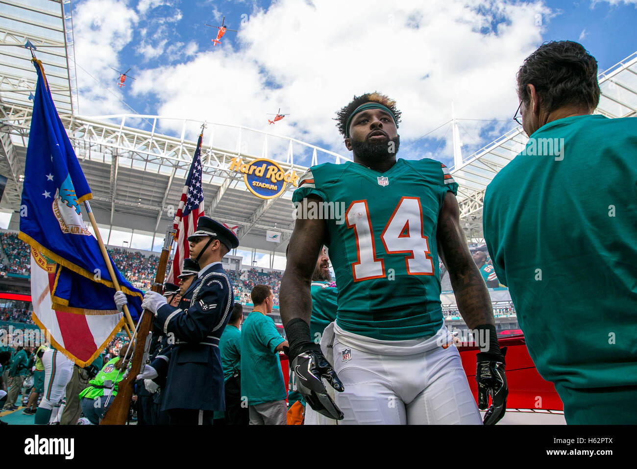 Miami Gardens, Florida, USA. 23rd Oct, 2016. Miami Dolphins wide receiver Jarvis Landry (14) during the national anthem at Hard Rock Stadium in Miami Gardens, Florida on October 23, 2016. Credit:  Allen Eyestone/The Palm Beach Post/ZUMA Wire/Alamy Live News Stock Photo