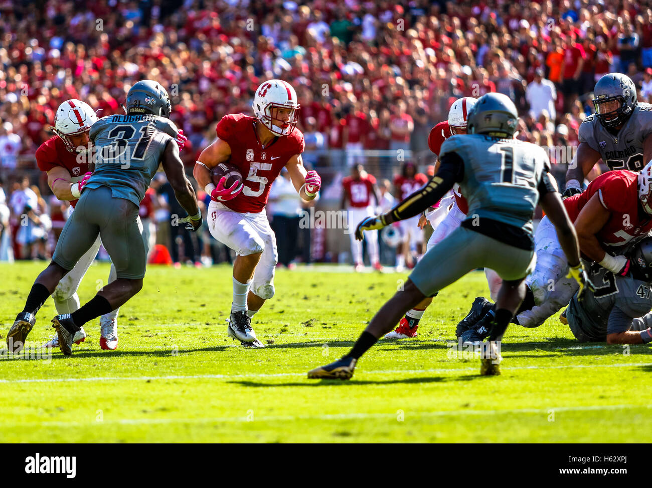 Palo Alto, California, USA. 22nd Oct, 2016. Stanford Running Back Christian McCaffrey (5) navigates a big hole in NCAA football action at Stanford University, featuring the Colorado Buffaloes visiting the Stanford Cardinal. Colorado won the game, 10-5. © Seth Riskin/ZUMA Wire/Alamy Live News Stock Photo
