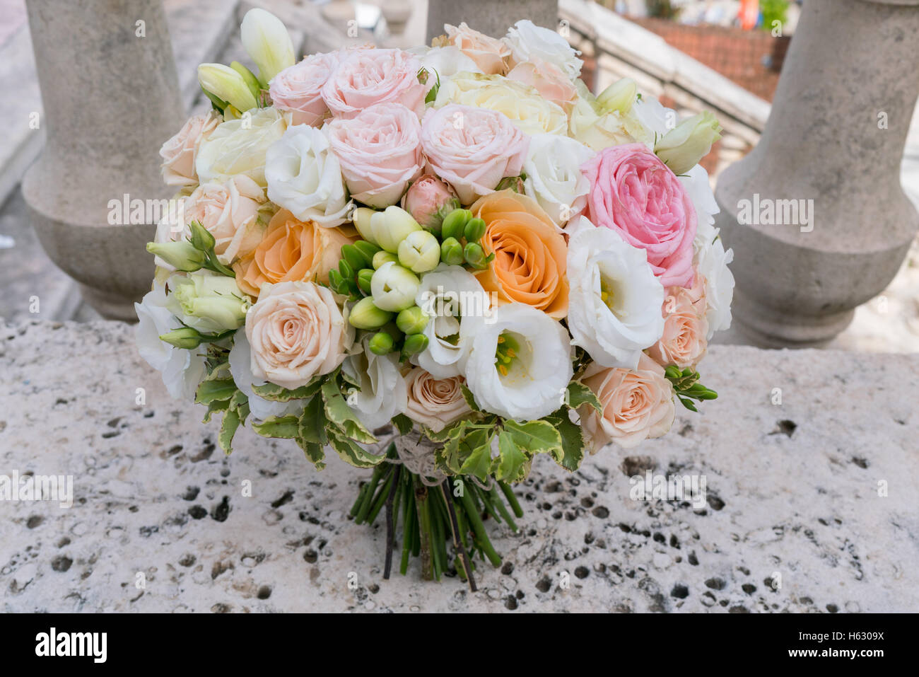 bridal bouquet of roses, freesia, eustoma Stock Photo