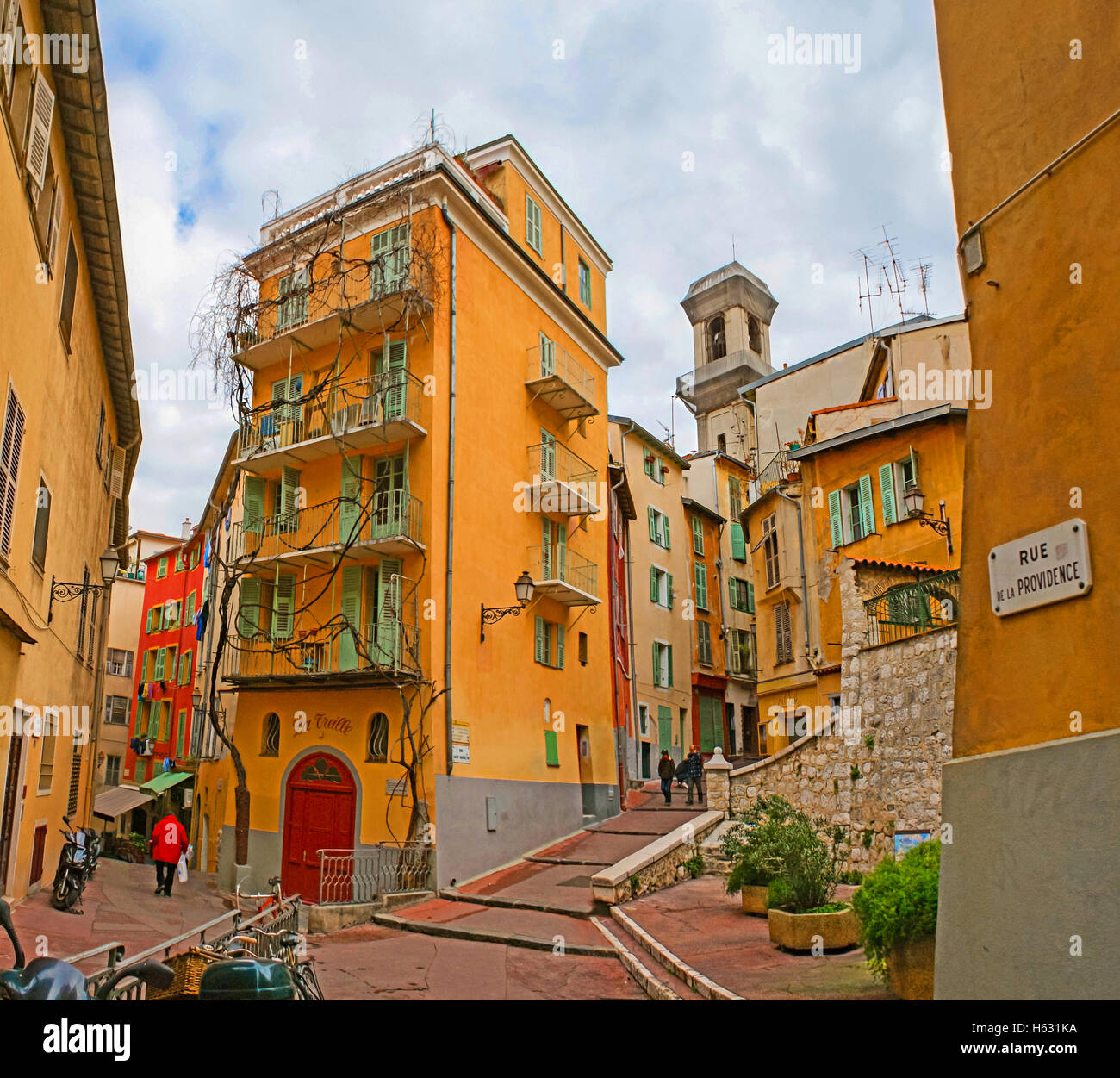 The pleasant walk through the labyrinth of the old quarters with the unusual colorful houses Stock Photo
