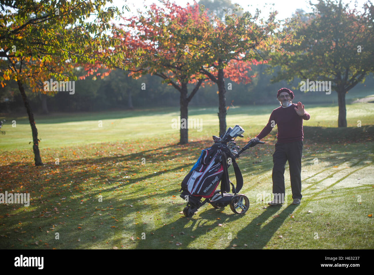 Autumnal scenes of golfers playing on Brent Valley golf course in west