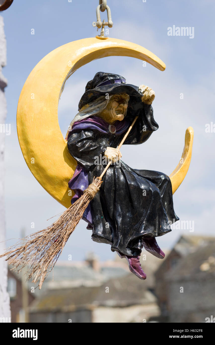 witch on a broom in moon