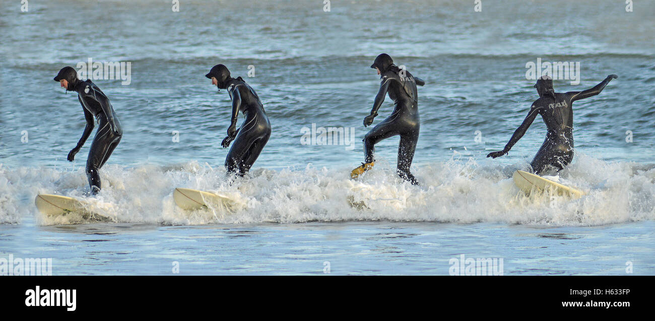 Winter surfer, multi exposure, winter, wetsuit, novice Stock Photo