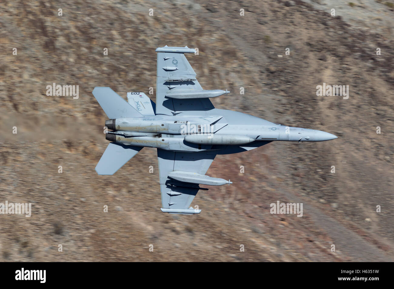 A VX-9 Vampire F/A-18F Super Hornet out of China Lake in low level flight through Star Wars Canyon. Stock Photo