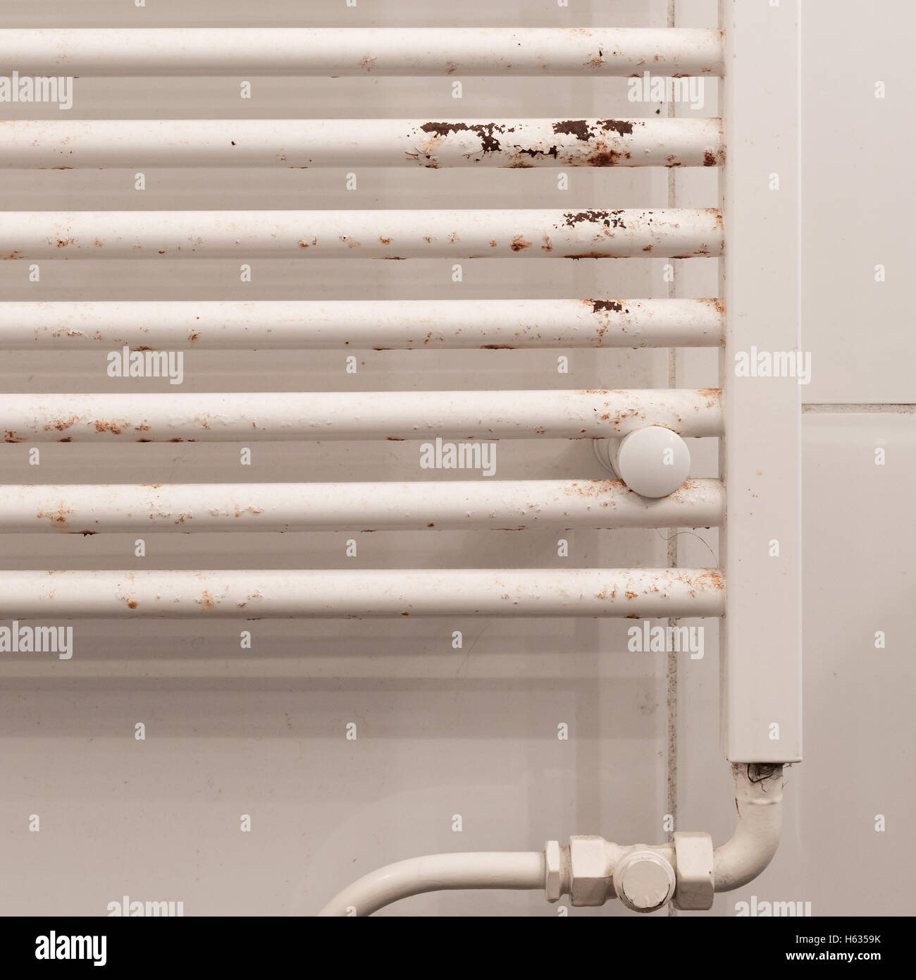 Rusty household cast iron radiator, in need of some TLC Stock Photo Alamy